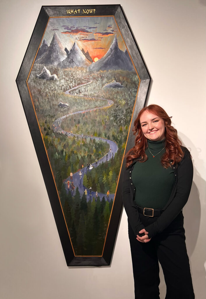 Lillian Acheson beside her art, Meaningful Things