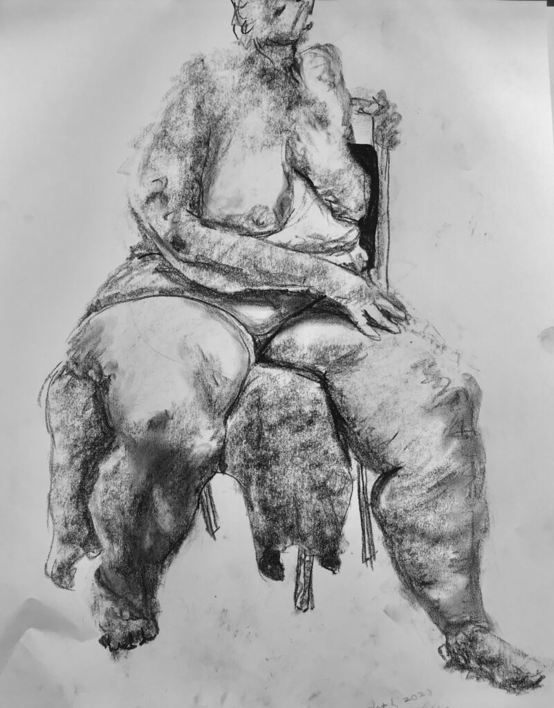 Charcoal drawing of a lady on a chair.